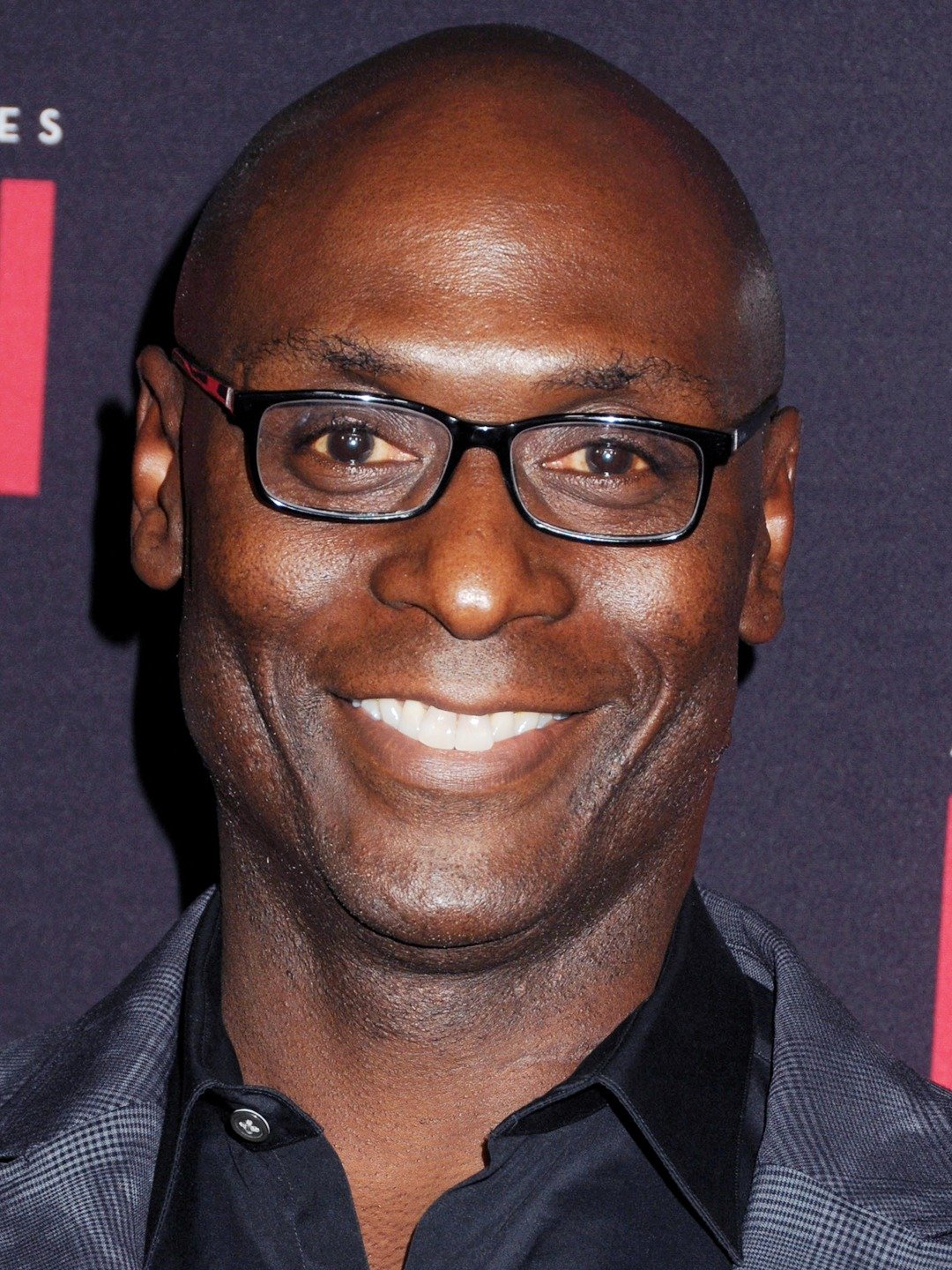 How tall is Lance Reddick?